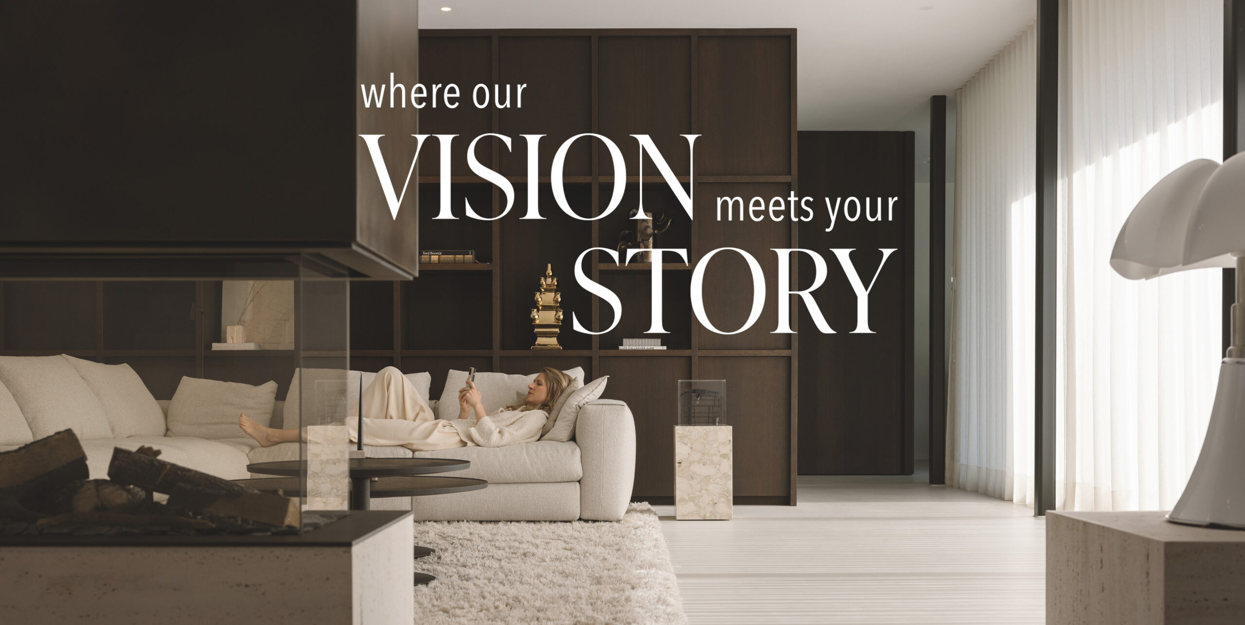 Living room interior featuring a fireplace, custom wooden cabinets and light linen sofa on a soft carpet. designed by I+Y. With a quote 'where our vision meets your story'.